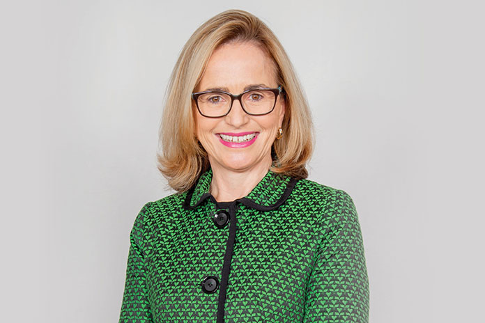 Woman facing camera for a headshot photo