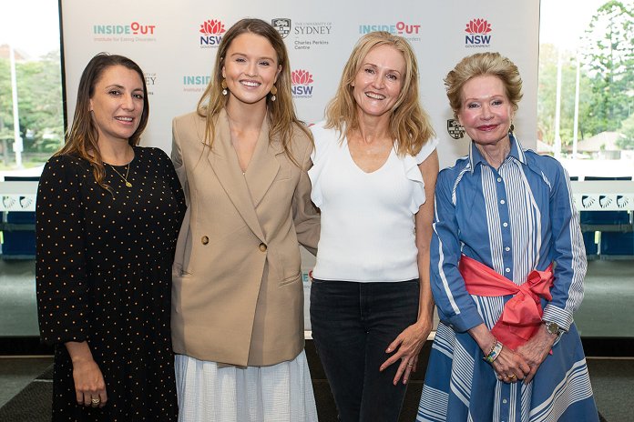 Four women standing together