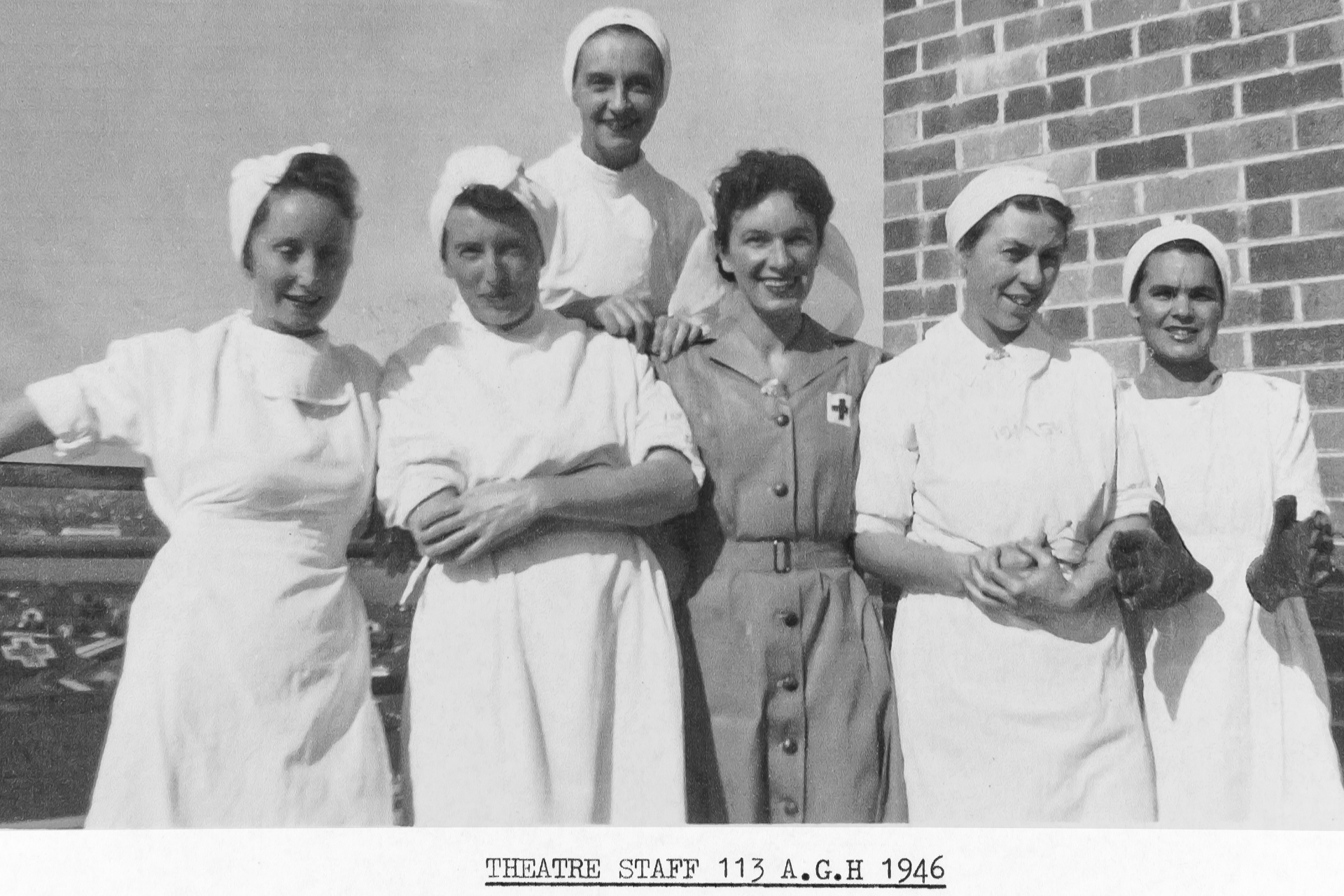black and white group photo of nurses in uniform