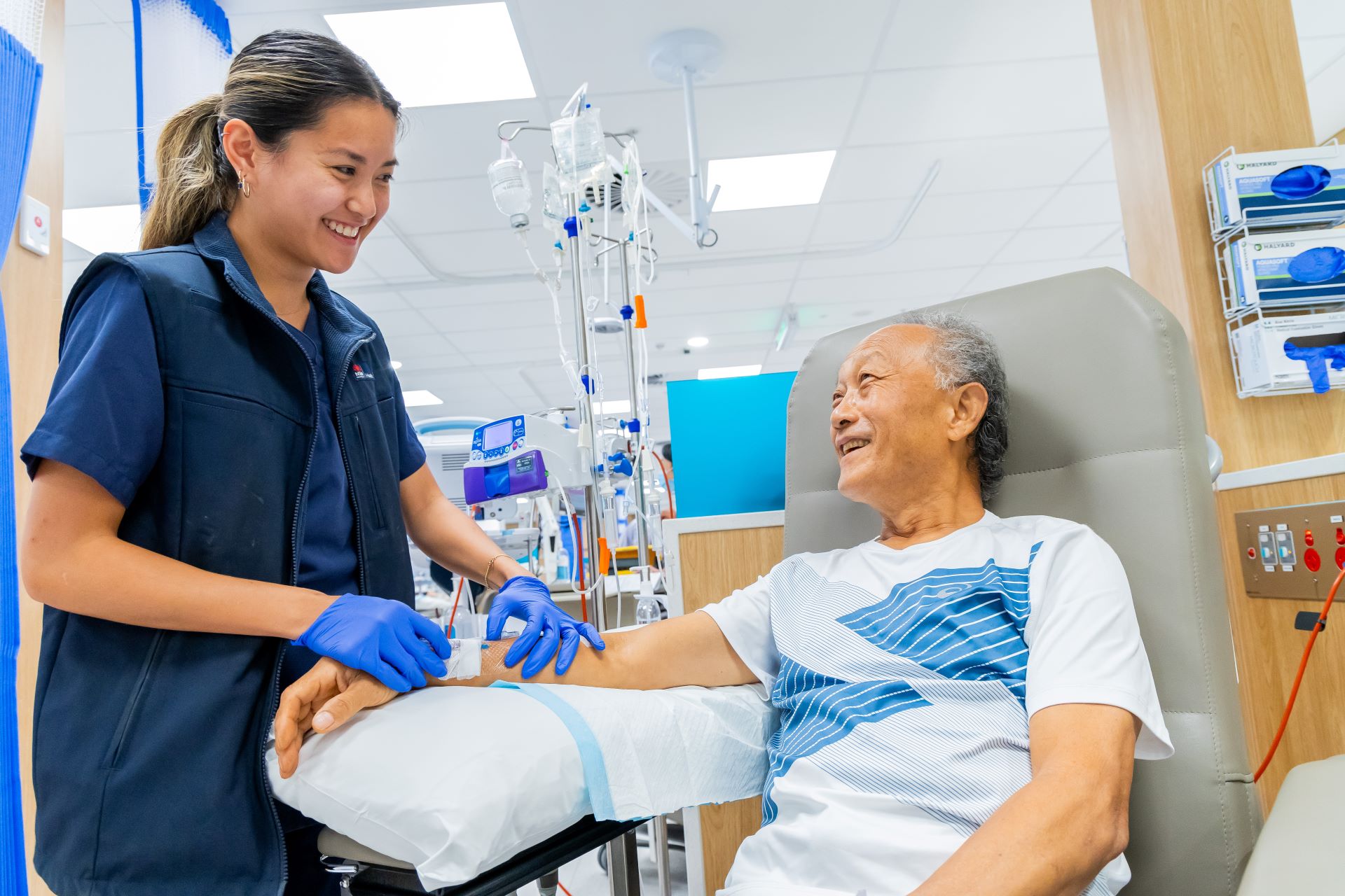 A nurse giving a patient a medication