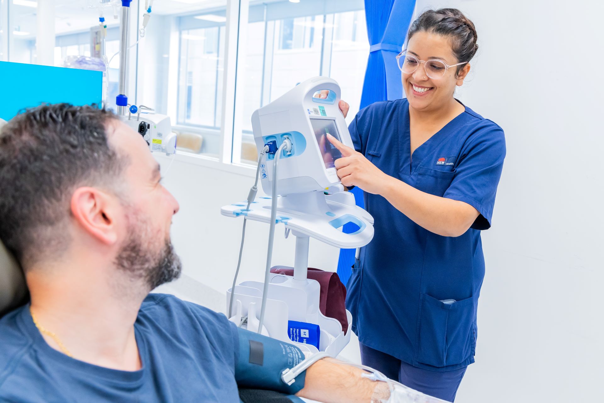 A nurse treating a patient