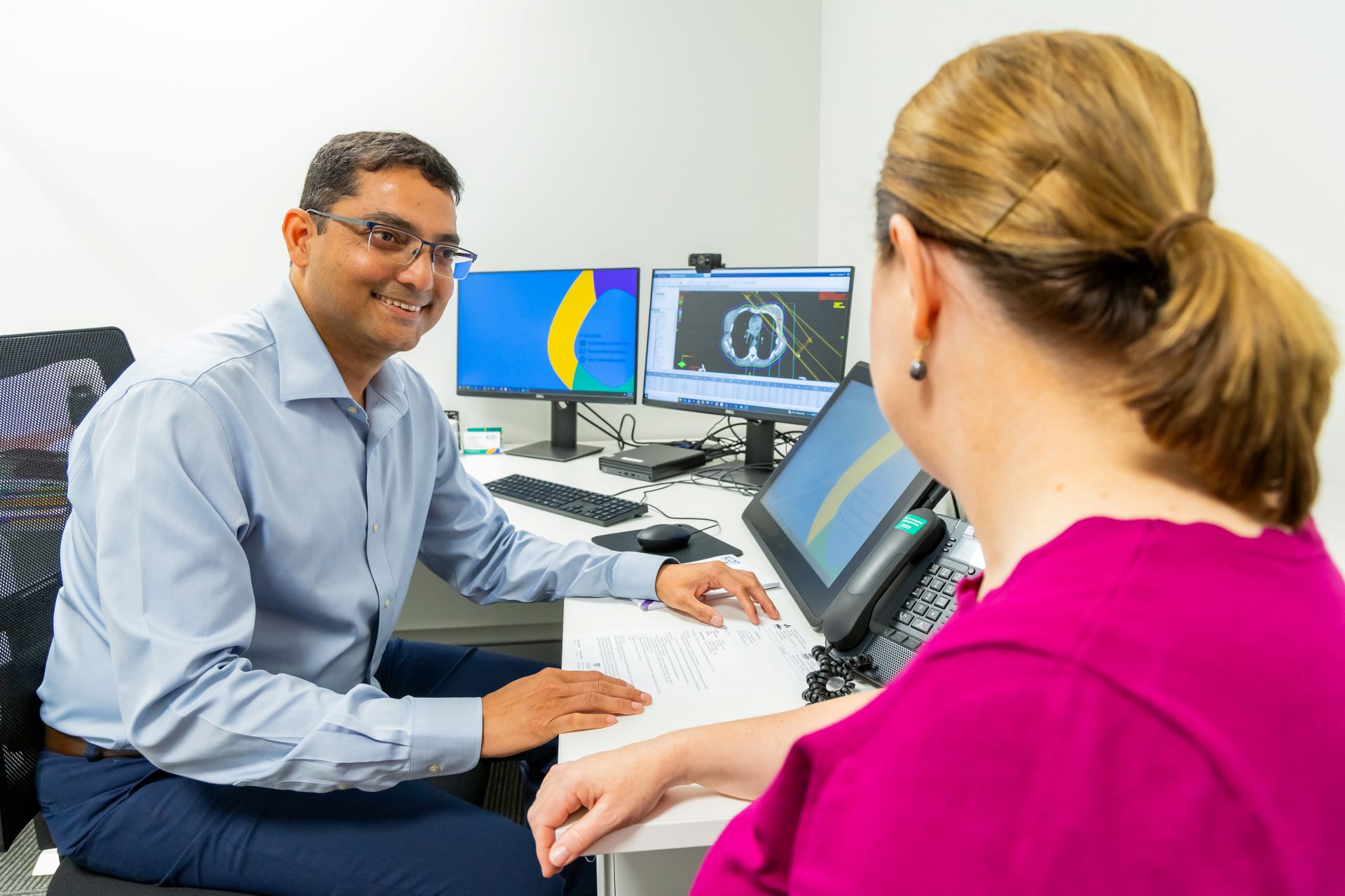 A doctor talking to a patient