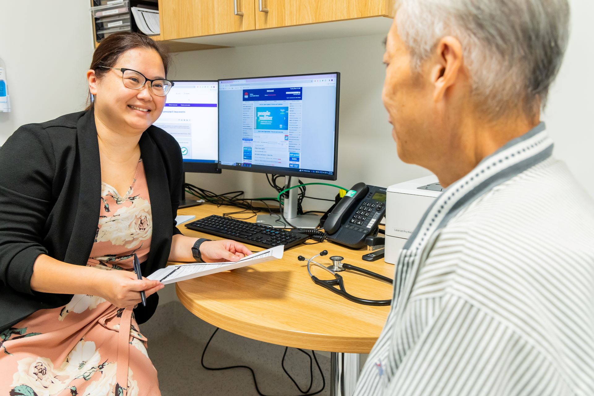 A doctor talking to a patient