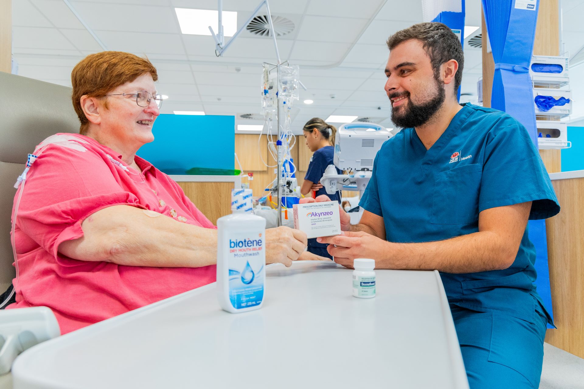 A patient speaking to a clinician