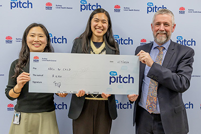 The Pitch winners holding cheque