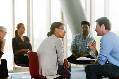 Group of people chatting together