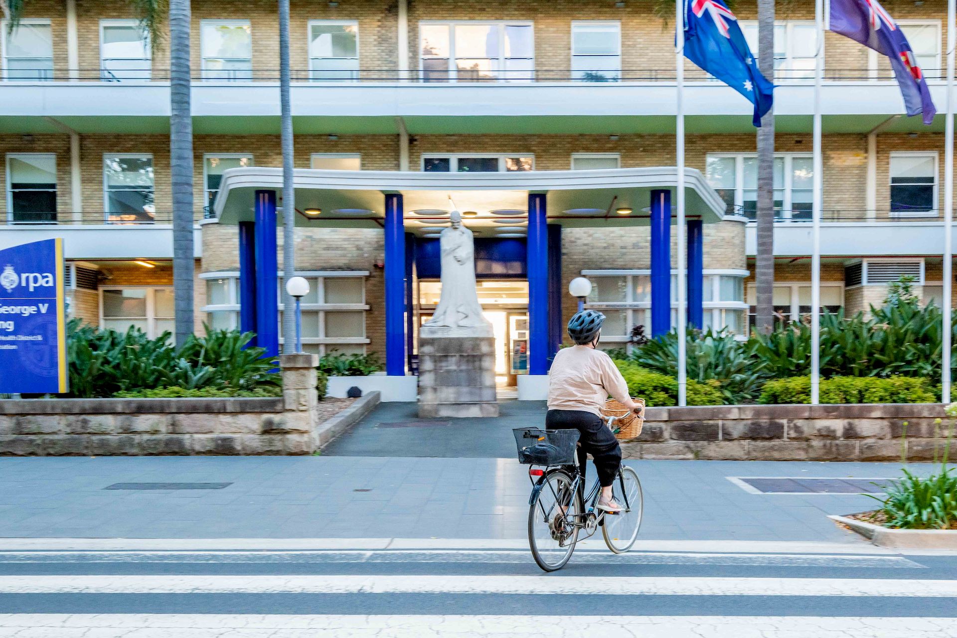 Women riding bike on RPA campus