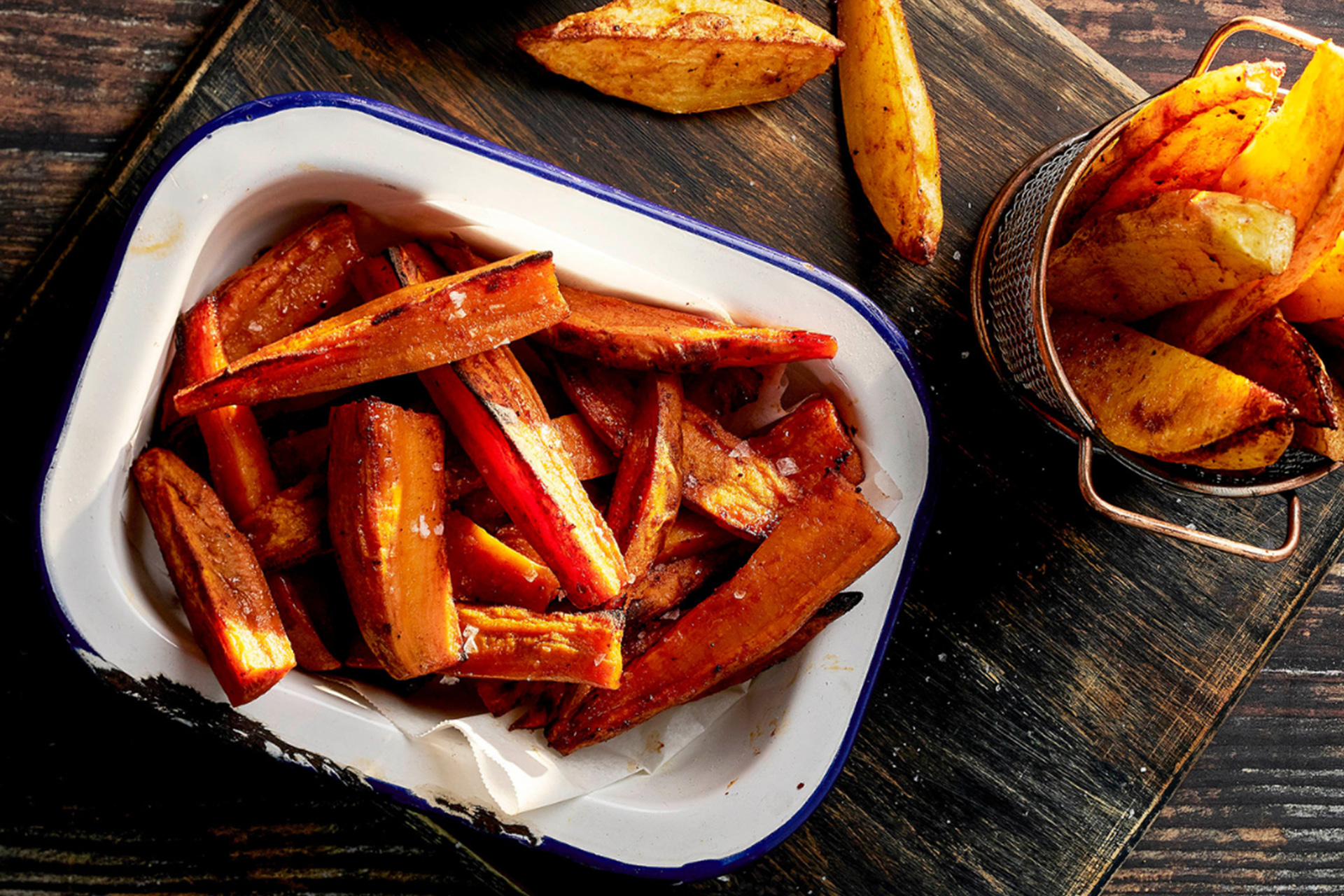 Over baked wedges served in white baking dish with blue trim