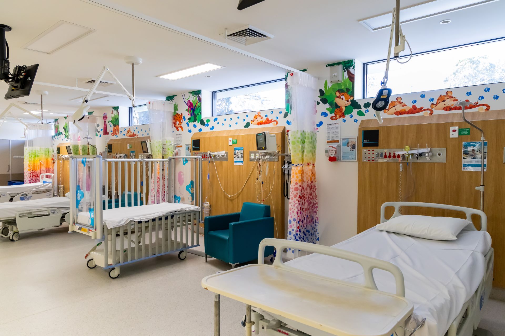 A children's ward with colourful artwork