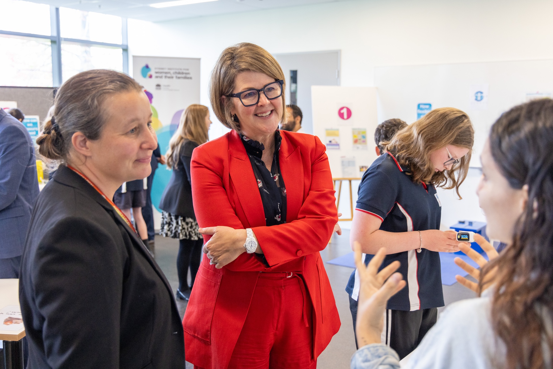 NSW HEalth Secretary speaks to teacher during her visit