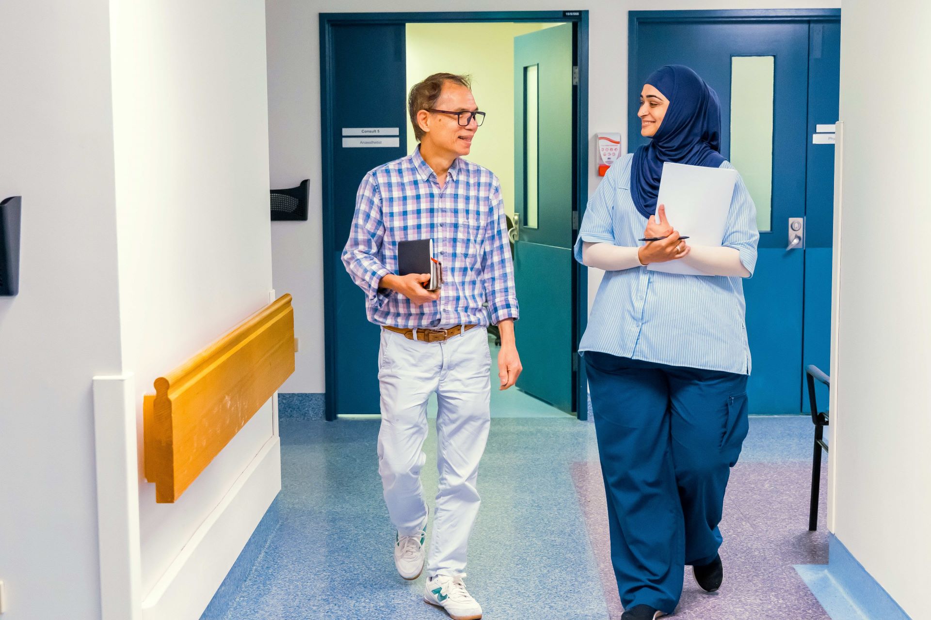 Interpreters walking in hall