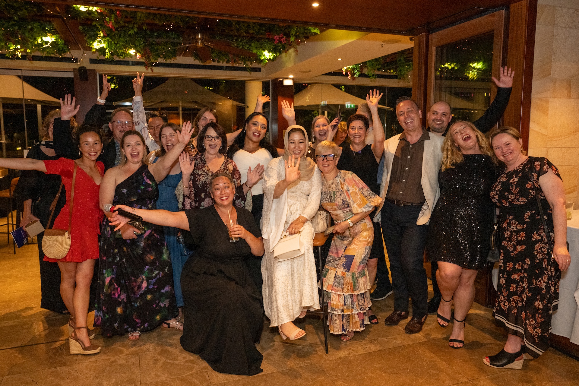 group photos of team celebrating 125 years of Sydney District Nursing