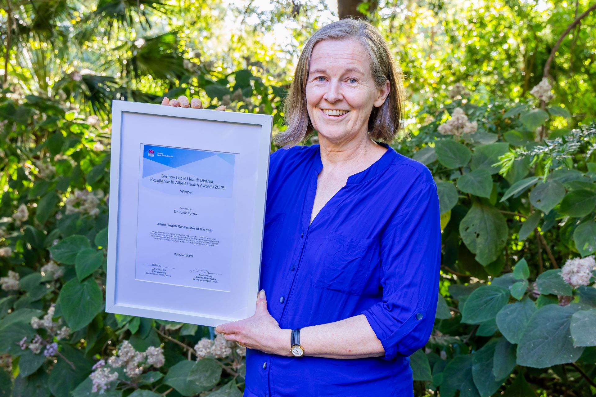 Award winner with certificate