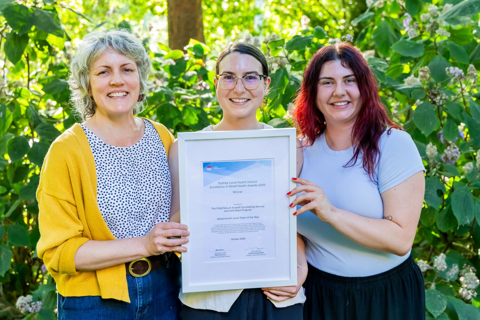 Award winners with certificate