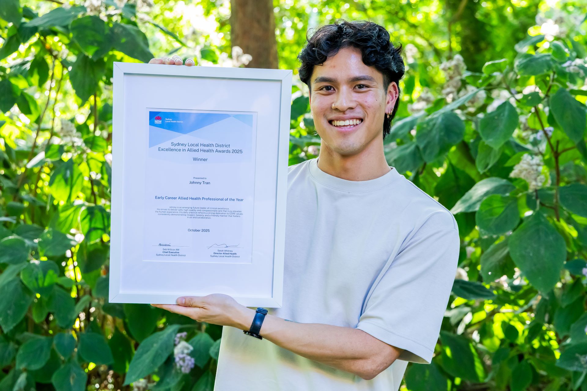 Award winner with certificate