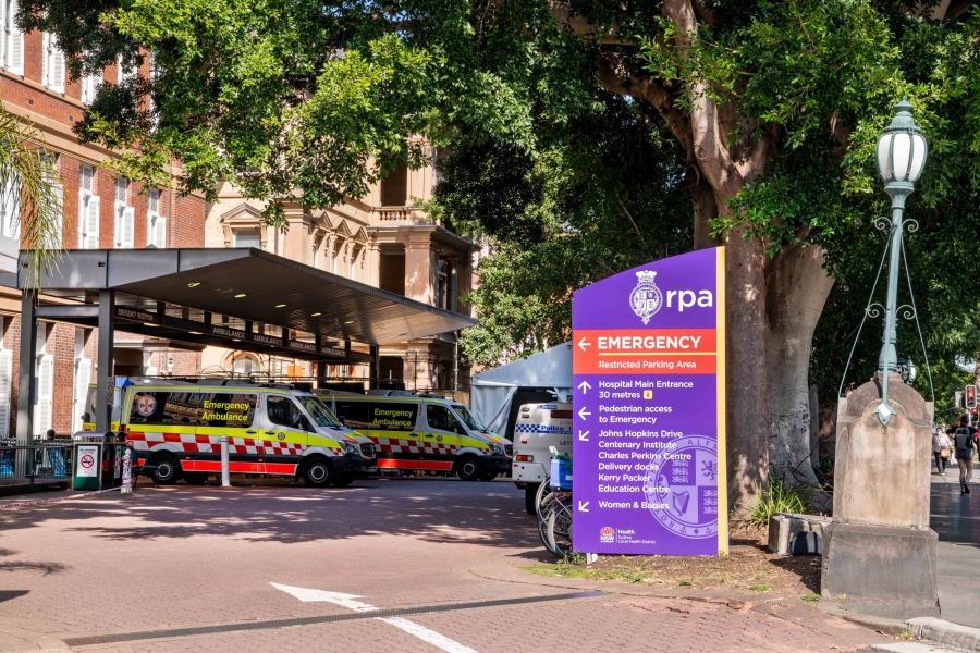 Two ambulances in waiting bays at the Royal Prince Alfred Hospital Emergency department.