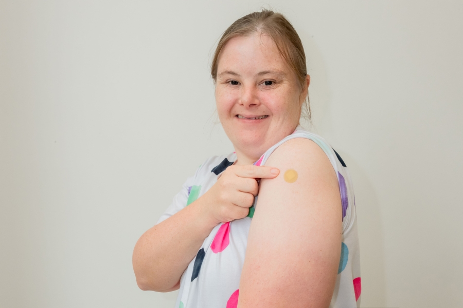 Disability advocate having vaccination