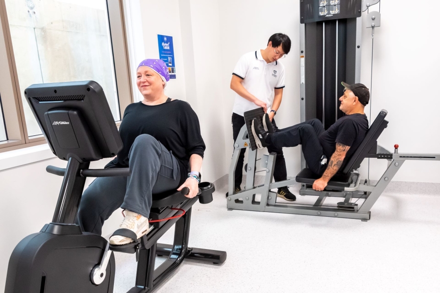 A gym with people exercising 
