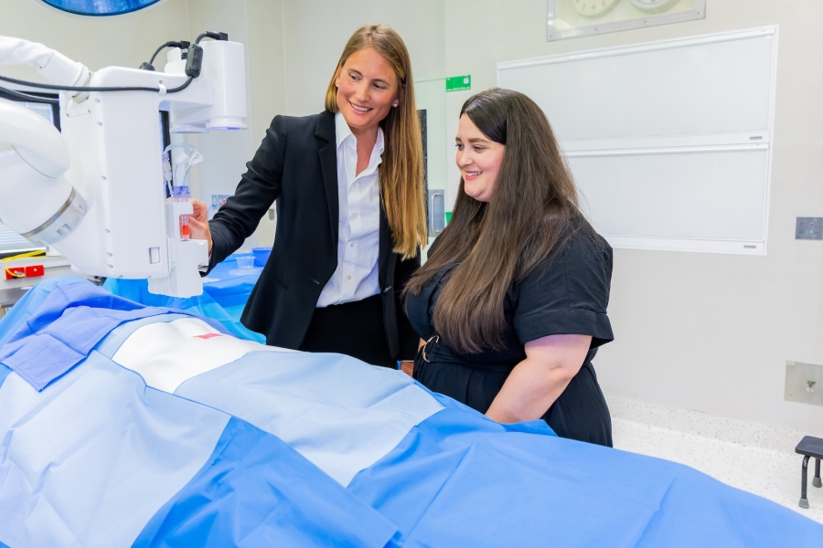 Photo of Dr Maitz with Ms Torbruegge next to the 3D skin printing machine at Concord Hospital